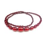 Mid century synthetic cherry amber necklace