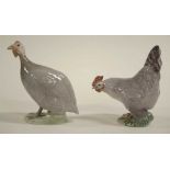 Two Royal Copenhagen bird figurines