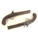 A pair of 19th C: flintlock dueling pistols