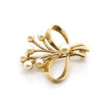 Early 20th C. pearl and rose gold flower brooch