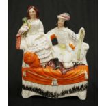Victorian Staffordshire Couple with Bird figure