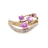 Synthetic pink sapphire set 9ct yellow gold ring