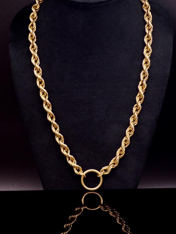 A large yellow gold rope twist chain necklace