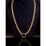 A large yellow gold rope twist chain necklace