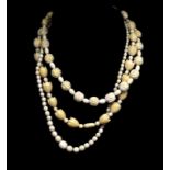Three vintage carved ivory necklaces c.1960s