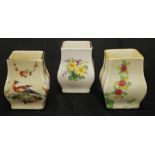 Three Royal Doulton miniature vases