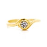 Solitaire diamond and yellow gold ring