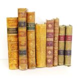 Eight various antique leather bound books