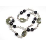 Pearl and onyx beaded opera length necklace