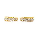 Diamond and yellow gold huggie earrings