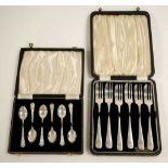 Two cased sets of 6 sterling silver flatware