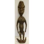 Antique PNG carved wood figure