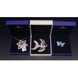 Three Swarovski boxed jewellery pieces