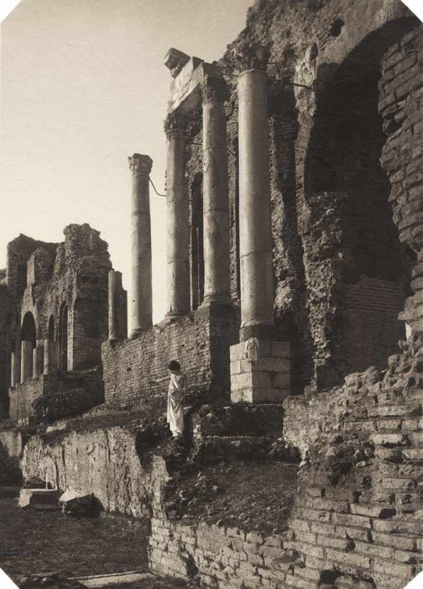 Gloeden, Wilhelm von: Draped youth in the Teatro Greco, Taormina