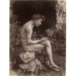 Gloeden, Wilhelm von: Young male nude contemplating flower