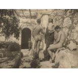 Gloeden, Wilhelm von: Young male nudes on terrace with trellis