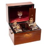 A Victorian mahogany chequer strung and inlaid travelling decanter box: of rectangular outline,