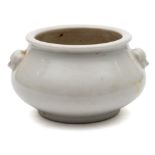 A small Chinese blanc de chine censer: of compressed globular form with mask head handles, 10.