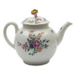 A First Period Worcester teapot and cover: of globular form with flower and stem finial,