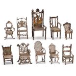 A collection of Dutch silver miniature furniture,