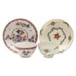 A First Period Worcester teabowl and saucer and one other: the first painted in famille rose style
