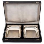 A pair of Indian silver rectangular dishes, stamped silver: of rectangular outline,