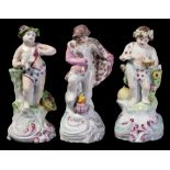 A set of three matched Plymouth porcelain putti emblematic of the Seasons: Winter wearing a fur