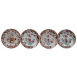 A set of three Chinese famille rose plates and one similar: painted with peonies,