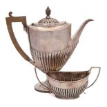 A Victorian silver coffee pot, maker Goldsmiths & Silversmiths Co, Sheffield,