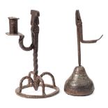 A 17th century wrought iron rush light holder: with hinged scissor action and candlestick holder on