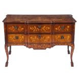 An early 19th Century Dutch mahogany and floral marquetry block front commode:,