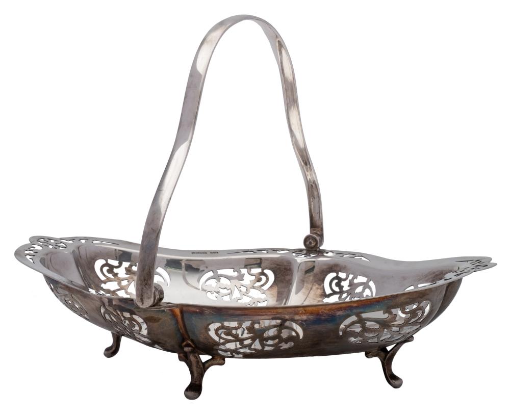 A George V silver swing-handled cake basket, maker Viners Ltd, Sheffield,