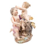 A Meissen group representing Summer and Autumn: in the form of two putti,