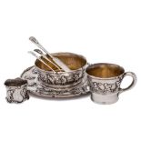 An American sterling silver 'Old King Cole' pattern nursery dinner set, stamped Sterling: inscribed,