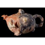 A Chinese carved soapstone teapot and cover: in the form of a pomegranate with stalk handle,