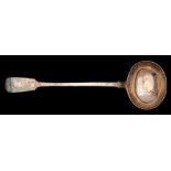 A Victorian silver fiddle pattern soup ladle, maker George Aldwinckle, London, 1848: crested,