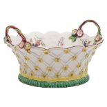 A fine Derby basket: with entwined twig handles,