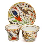 Three Chamberlain Worcester porcelain trios: comprising two cups with 'griffin head' handles and a