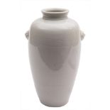 A Chinese blanc de chine ovoid vase: with mythical beast handles,