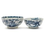 A First Period Worcester blue and white bowl and one similar: the first painted in the 'Prunus