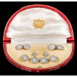 A suite of 18ct gold, mother of pearl and seed-pearl mounted buttons,