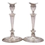 WITHDRAWN - A pair of Edward VII silver table candlesticks, maker Elkington & Co, London,