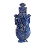 A Chinese lapis lazuli vase and cover: of flattened baluster form with lion dog and key pattern