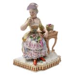 A Vienna porcelain figure in the Meissen manner: emblematic of the Sense of Smell,