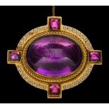 A late 19th century enamelled gold and cabochon amethyst oval brooch: the oval amethyst