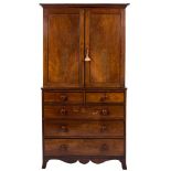 An early 19th Century mahogany and inlaid linen press:,