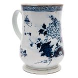 A large Liverpool [Richard Chaffers] blue and white bell-shaped mug: painted with pierced rockwork,