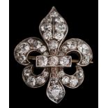 A late 19th century gold, silver and diamond mounted fleur-de-lis brooch: set with round old,