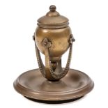 Tiffany and Co, a bronze inkwell: the well of ovoid form with hinged lid,