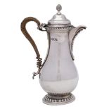 A Victorian silver hot water jug, maker Charles Stuart Harris, London,